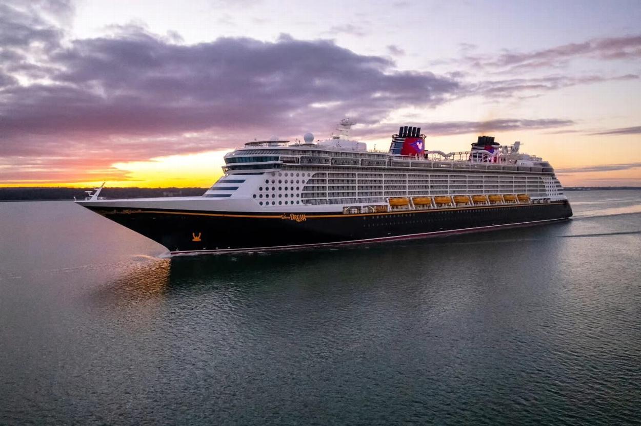 Disney Dream cruise ship arriving at the Port of Southampton at sunrise
