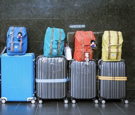 Cruise transfer luggage example with four large suitcases and four smaller bags